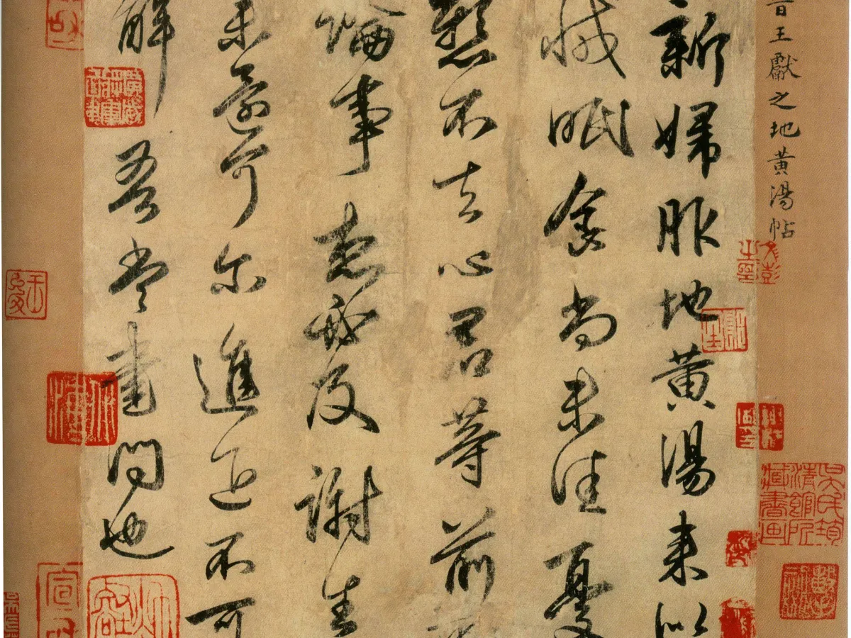 Chinese calligraphy written in black ink with red collector seals